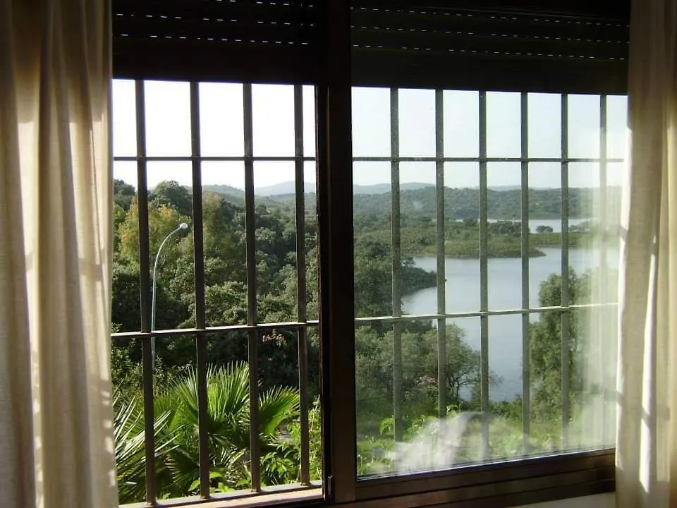 Casa con encanto frente al lago El Ronquillo Сasa de vacaciones